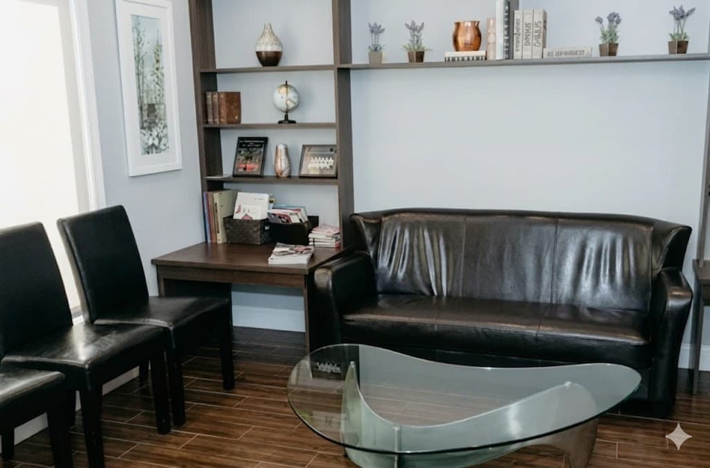 Comfortable waiting area with leather seating and bookshelf